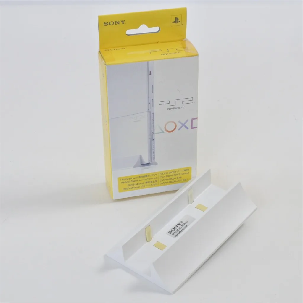 BASE VERTICAL PARA CONSOLA PS2 SONY BLANCA